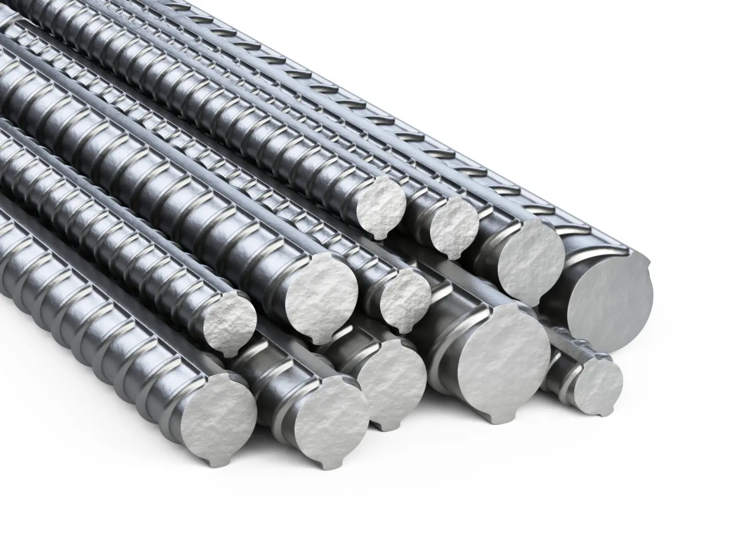 Stacked steel rebar rods on white background.