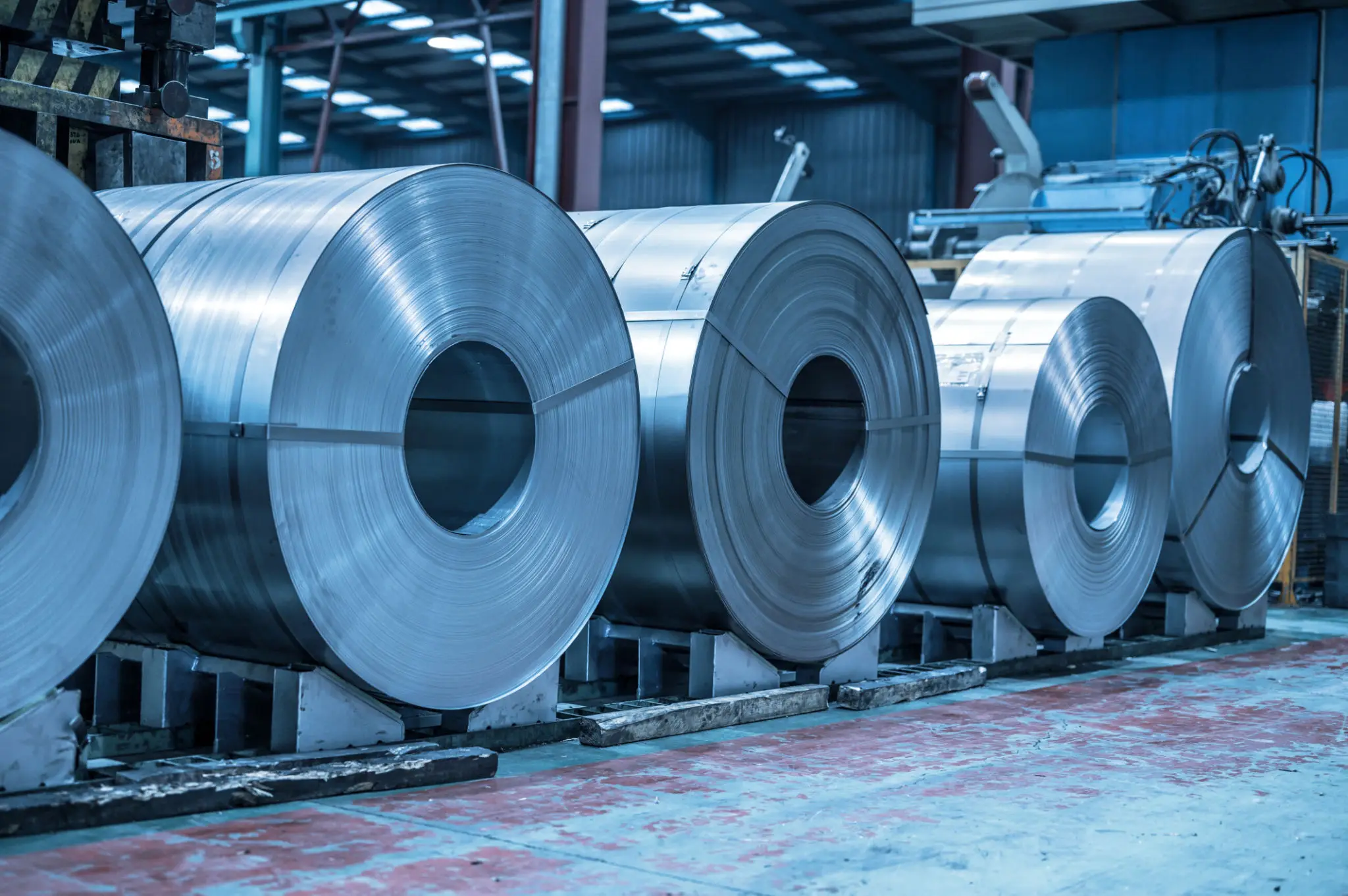 Industrial rolled steel coils on pallets